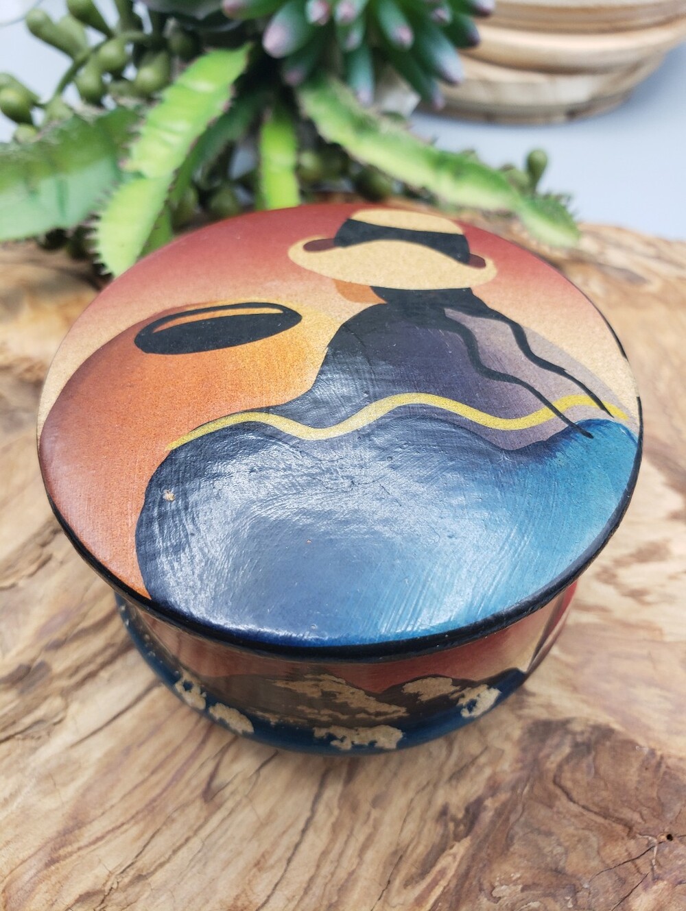 Signed by "Aguila" Peruvian Pottery- Handpainted Lady in Hat w/ Mountains & Jars
